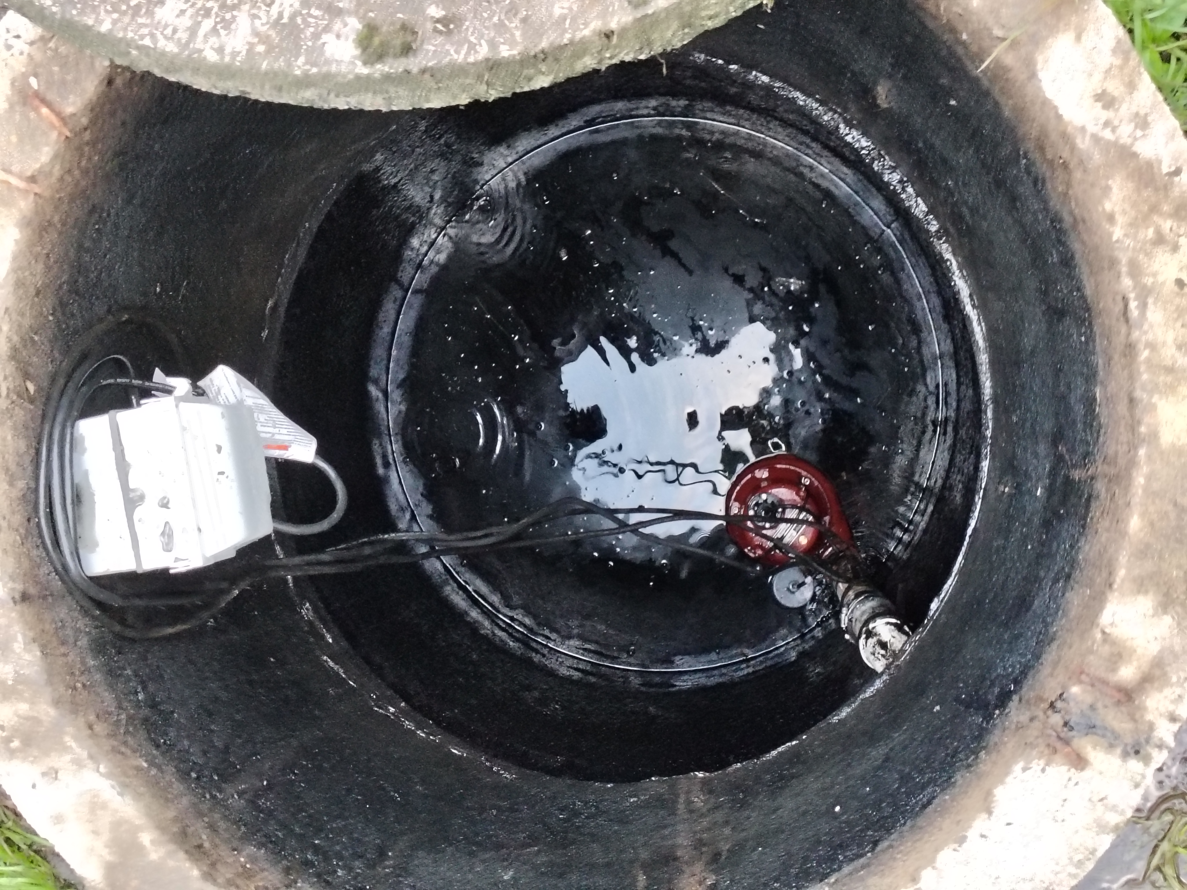 Wide view of the completed septic pump chamber installation in Waverly Pennsylvania